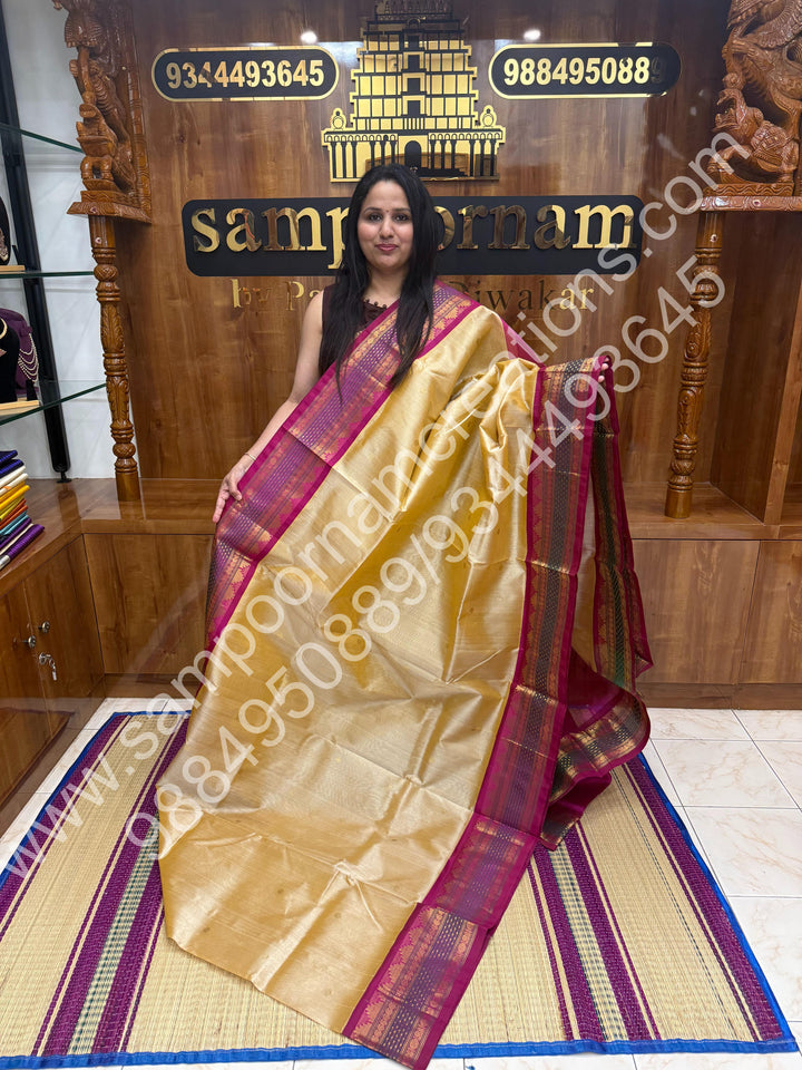 Biscuit with Magenta  , Rich Rudraksh Zari butta with Traditonal Lakshadeepam  Border and Rich Pallu Pure Korvai Silk Cotton Saree