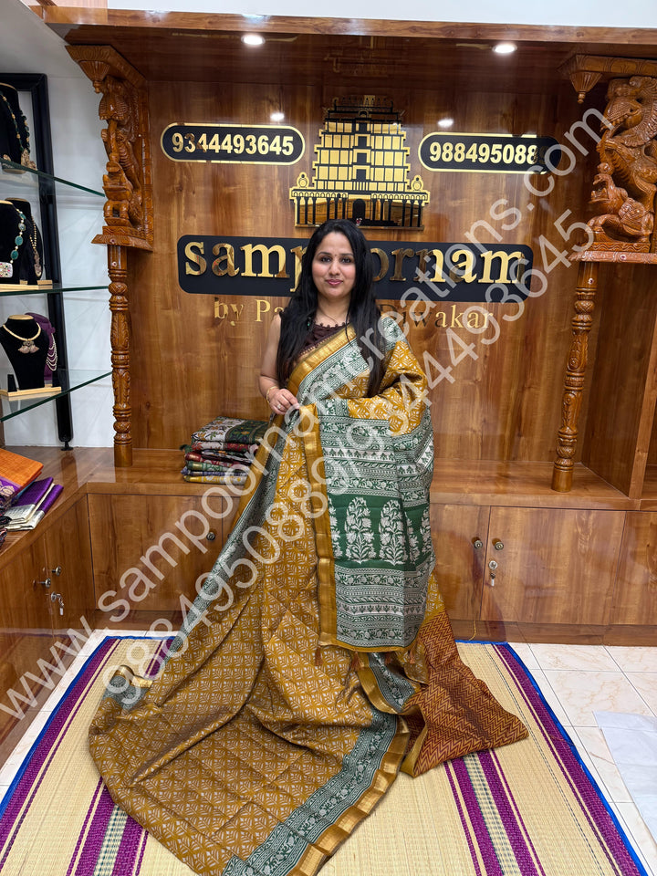 Mustard with Green  , Floral Prints in the body , Printed Blouse and Tassels in the Pallu , Soft Cotton Saree