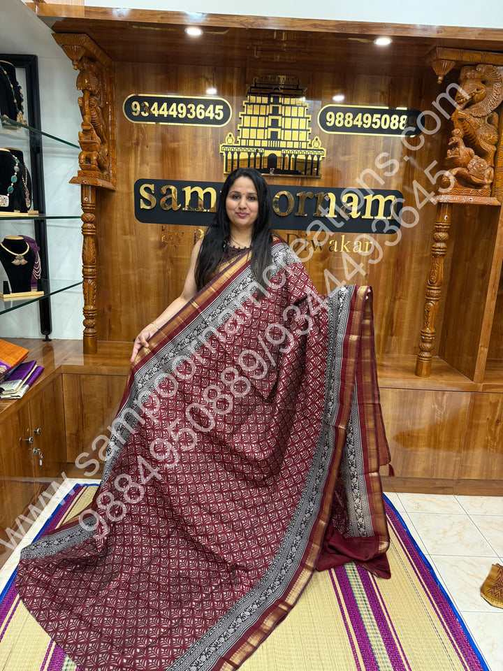 Red with Black  , Floral Prints in the body , Printed Blouse and Tassels in the Pallu , Soft Cotton Saree