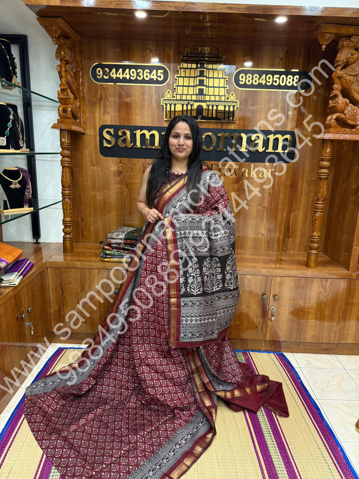 Red with Black  , Floral Prints in the body , Printed Blouse and Tassels in the Pallu , Soft Cotton Saree