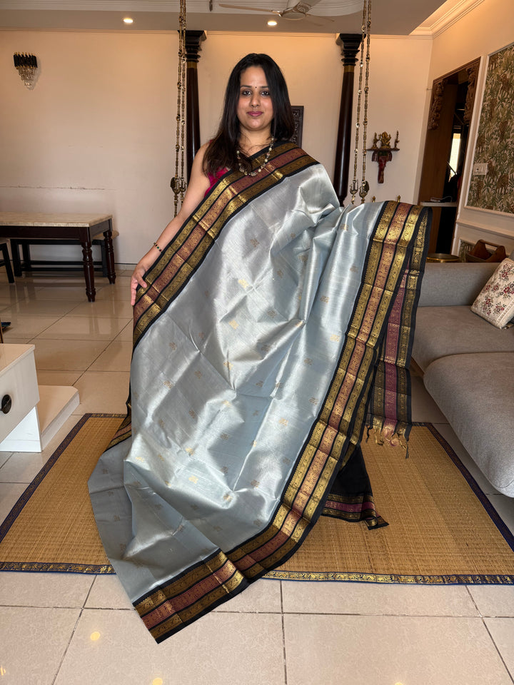 Grey with Black Rich Zari Butta in the body , Kanchi border and rich pallu Korvai Silk Cotton Saree