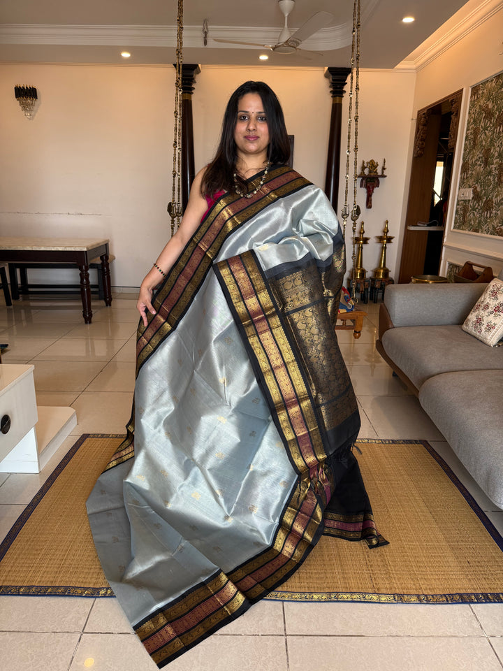 Grey with Black Rich Zari Butta in the body , Kanchi border and rich pallu Korvai Silk Cotton Saree