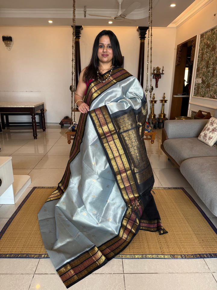 Grey with Black Rich Zari Butta in the body , Kanchi border and rich pallu Korvai Silk Cotton Saree