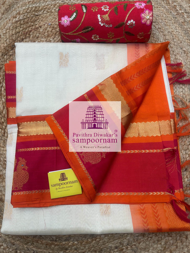 Offwhite with Orange, Rich Zari Butta in the Body, Traditional Borders with Peacock Motifs and Grand Pallu Korvai Silk Cotton Saree