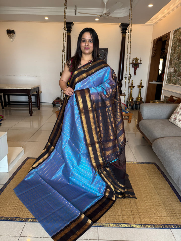 Steel Blue with Dark Brown  colour ,rich zari checks in the body ,traditional borders  and rich pallu Korvai Silk Cotton Saree