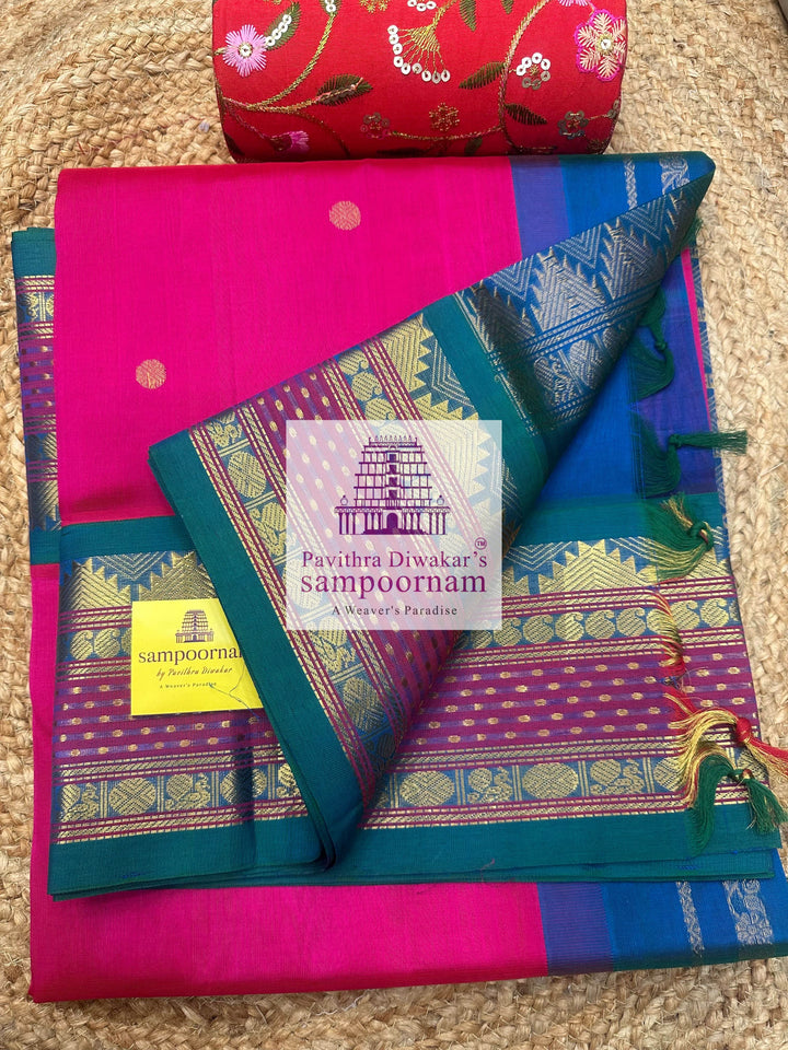 Magenta with Mayil Kazhuthu Blue, Zari Butta in the Body, Rettapet Lakshadeepam Butta Borders and Grand Pallu Korvai Silk Cotton Saree