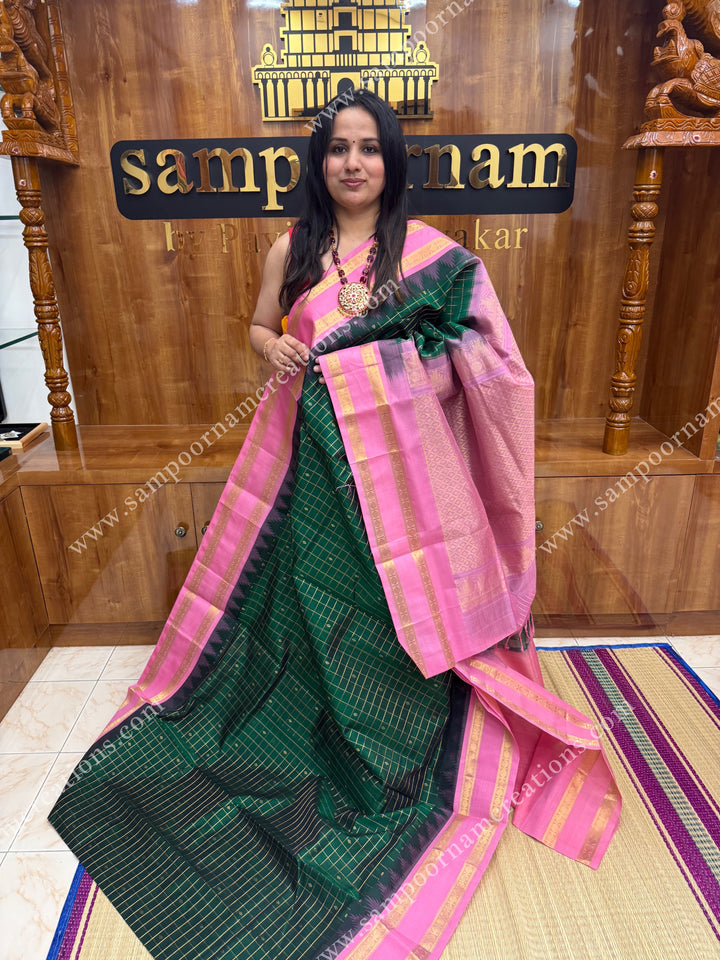 Green with Baby Pink , rich Zari checks and butta in the body  with temple borders , grand Pallu Korvai Silk Cotton Saree